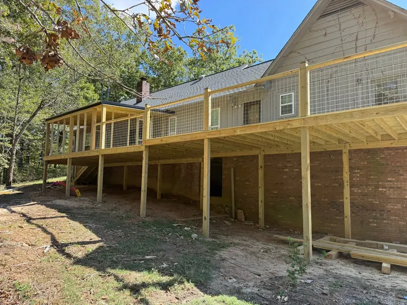 Elevated wood deck on a brick home